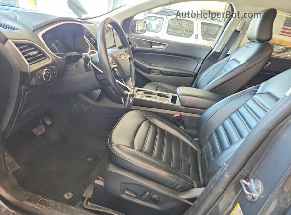 2FMPK4J90MBA01632 2021 FORD EDGE Gray Vista interior delantera