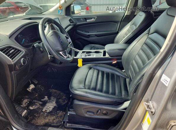 2FMPK4J90RBA68478 2024 FORD EDGE Silver Widok wnętrza z przodu
