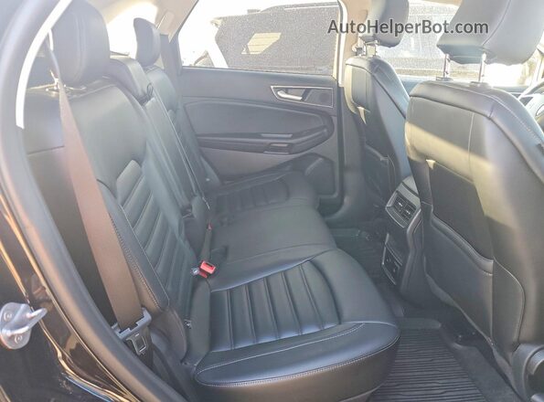 2FMPK4J90RBB12737 2024 FORD EDGE Black Սալոնի հետևի տեսք