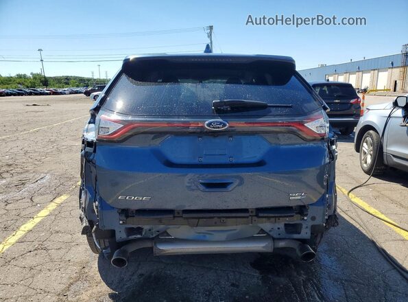 2FMPK4J91JBB04070 2018 FORD EDGE Blue Rear view