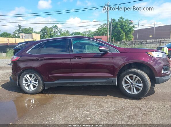 2FMPK4J91KBC75208 2019 FORD EDGE Burgundy Rear interior view