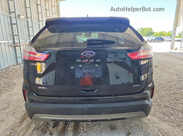 2FMPK4J91PBA16242 2023 FORD EDGE Black Հետևի տեսք