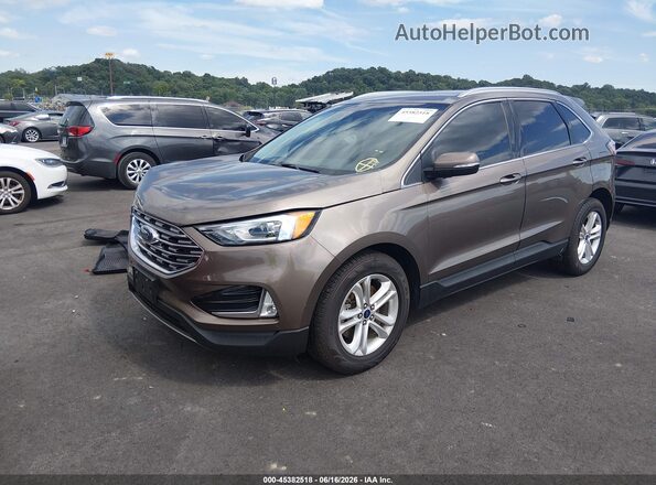 2FMPK4J92KBB00255 2019 FORD EDGE Brown Vista tres cuartos delantera izquierda