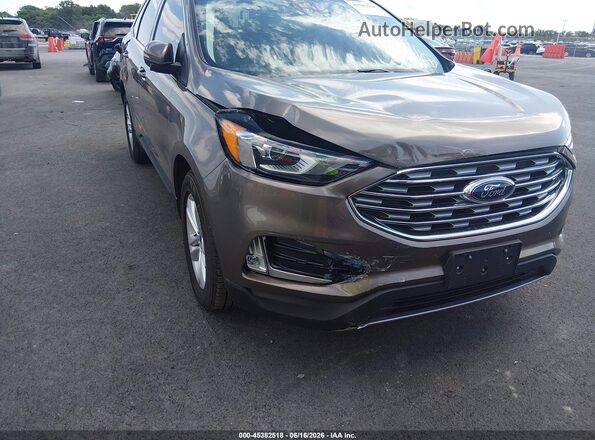 2FMPK4J92KBB00255 2019 FORD EDGE Brown Vista frontal
