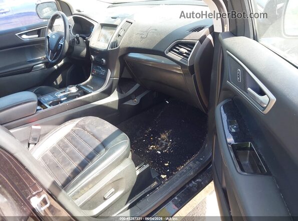 2FMPK4J92KBB17329 2019 FORD EDGE Black Front interior view