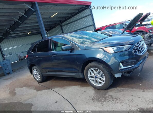 2FMPK4J92NBA93618 2022 FORD EDGE Blue Вид задньої частини салону