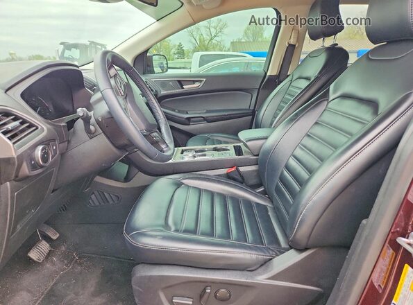 2FMPK4J92RBA99571 2024 FORD EDGE Бордовый Вид салона спереди