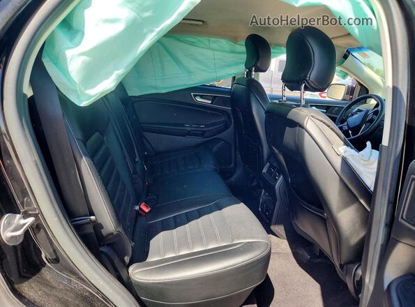 2FMPK4J93GBC10710 2016 FORD EDGE Black Rear seats view
