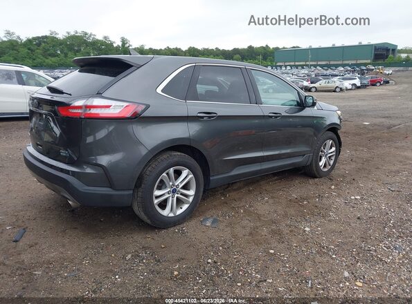 2FMPK4J93KBC25104 2019 FORD EDGE Gray Trasero derecho