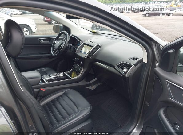 2FMPK4J93KBC25104 2019 FORD EDGE Gray Vista interior delantera
