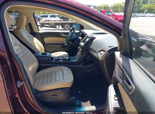 2FMPK4J93LBB25733 2020 FORD EDGE Maroon Vista interior delantera