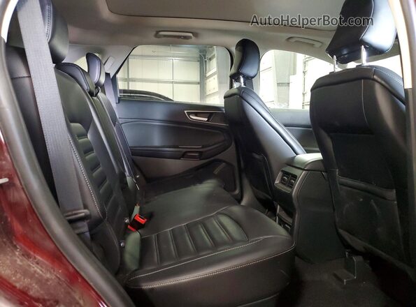 2FMPK4J93RBB09850 2024 FORD EDGE Maroon Widok wnętrza z tyłu