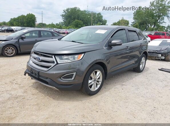 2FMPK4J94GBC35678 2016 FORD EDGE Gray Vista tres cuartos delantera izquierda
