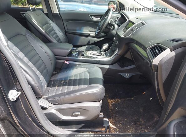 2FMPK4J94GBC38970 2016 FORD EDGE Черный Вид салона спереди