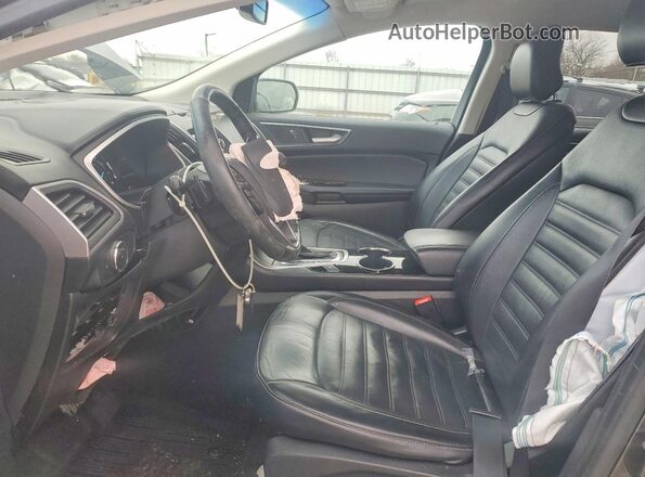 2FMPK4J94HBB44945 2017 FORD EDGE Gray Front interior view