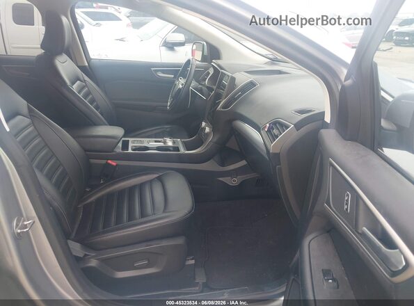 2FMPK4J94MBA26582 2021 FORD EDGE Silver წინა სალონის ხედი