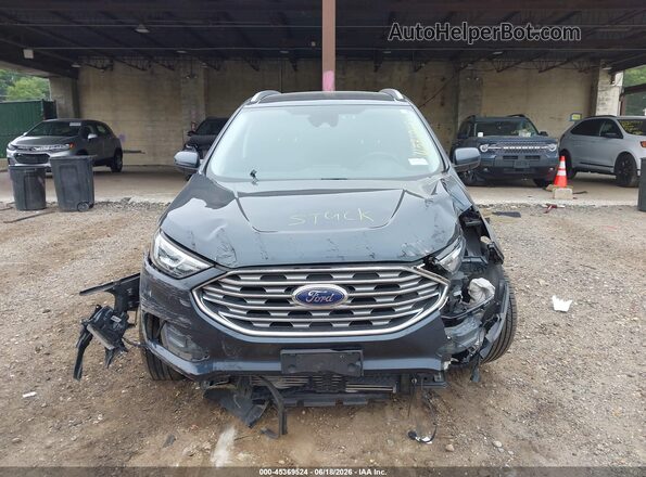 2FMPK4J94NBA21772 2022 FORD EDGE Blue Rear interior view