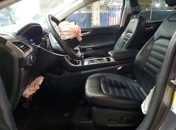2FMPK4J94PBA54774 2023 FORD EDGE Silver Front interior view