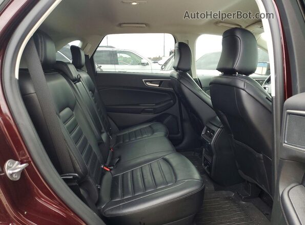2FMPK4J94RBA05724 2024 FORD EDGE Maroon Vista interior trasera