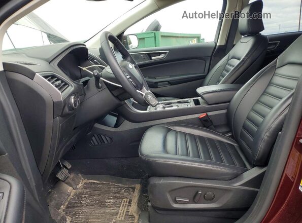 2FMPK4J94RBA05724 2024 FORD EDGE Maroon Vista interior delantera