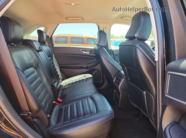 2FMPK4J94RBA88667 2024 FORD EDGE Black Vista interior trasera
