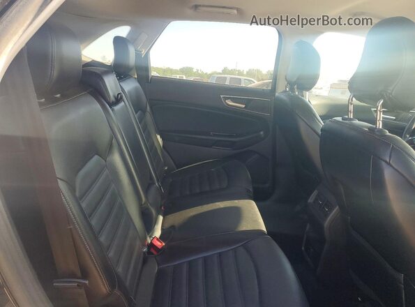 2FMPK4J95JBC39925 2018 FORD EDGE Черный Вид задней части салона
