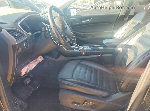 2FMPK4J95JBC39925 2018 FORD EDGE Черный Вид салона спереди