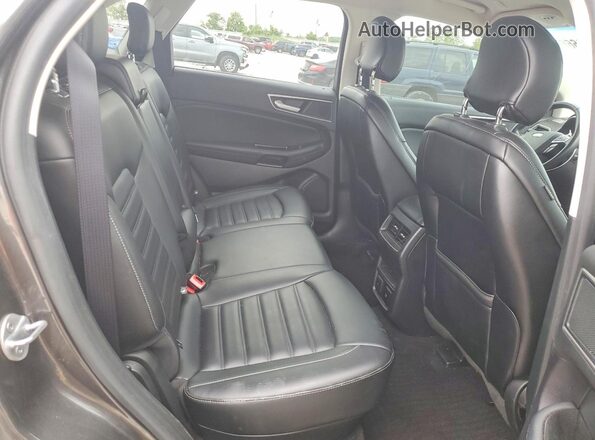 2FMPK4J95KBB49708 2019 FORD EDGE Gray Widok wnętrza z tyłu