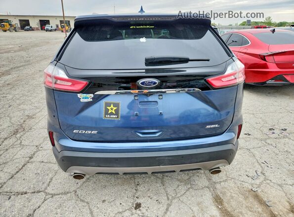 2FMPK4J95KBB57727 2019 FORD EDGE Blue Rear view