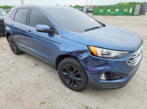 2FMPK4J95KBB57727 2019 FORD EDGE Blue Front right