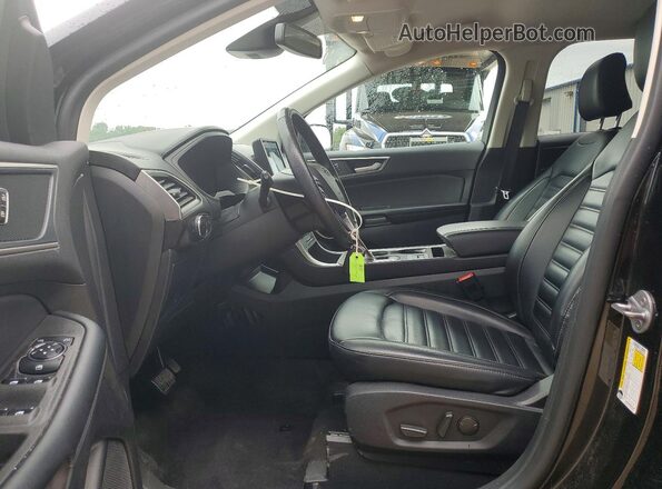 2FMPK4J95RBA95918 2024 FORD EDGE Black Вид салону спереду