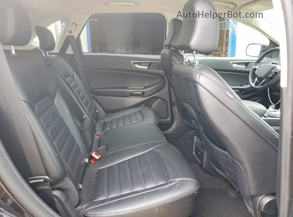 2FMPK4J95RBA95918 2024 FORD EDGE Black Вид задньої частини салону