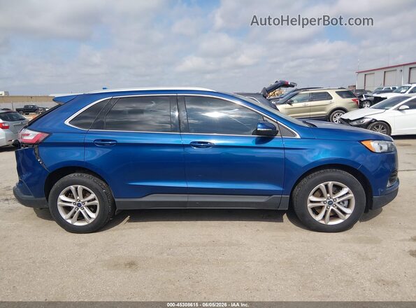 2FMPK4J96LBA18708 2020 FORD EDGE Blue Widok wnętrza z tyłu