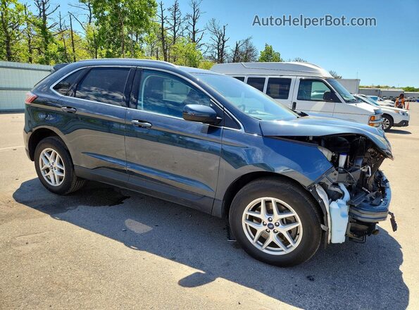 2FMPK4J96NBA89992 2022 FORD EDGE Blue Front right