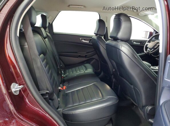 2FMPK4J96RBA79209 2024 FORD EDGE Burgundy Vista interior trasera
