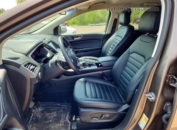 2FMPK4J97KBB17732 2019 FORD EDGE Brown Вид салону спереду