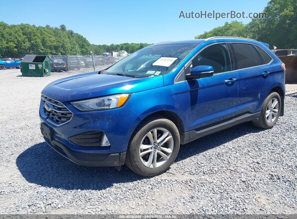 2FMPK4J97LBA01593 2020 FORD EDGE Blue Przód lewy