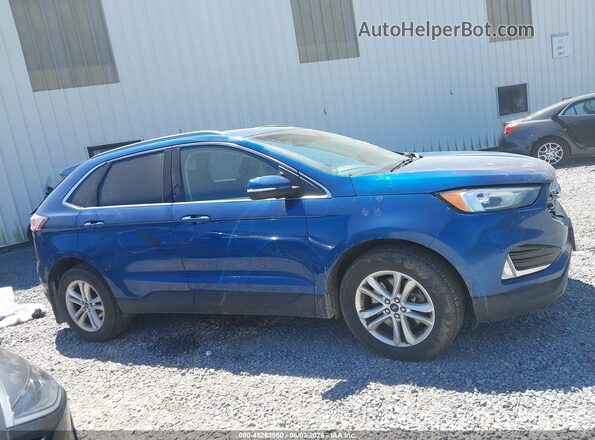 2FMPK4J97LBA01593 2020 FORD EDGE Blue Widok wnętrza z tyłu