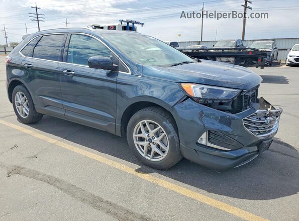 2FMPK4J97NBA88432 2022 FORD EDGE Blue Front right