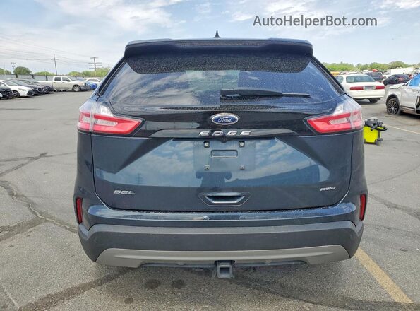 2FMPK4J97NBA88432 2022 FORD EDGE Blue Rear view