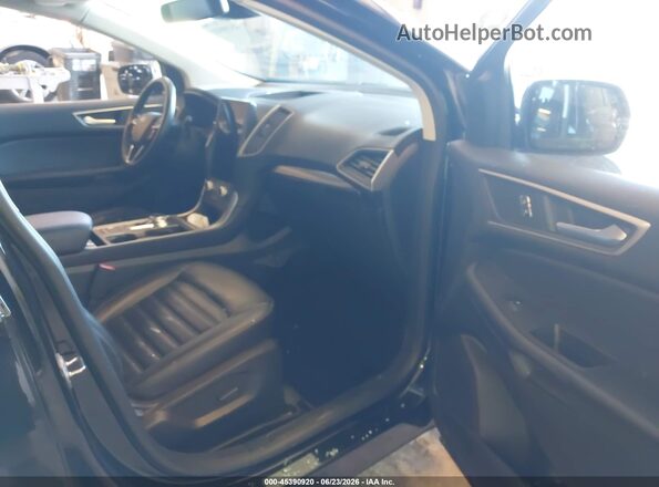 2FMPK4J97PBA17573 2023 FORD EDGE Black Вид салону спереду