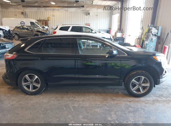 2FMPK4J97PBA17573 2023 FORD EDGE Black Вид задньої частини салону