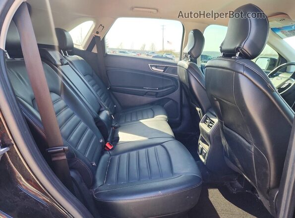 2FMPK4J98JBB64220 2018 FORD EDGE Черный Вид задней части салона