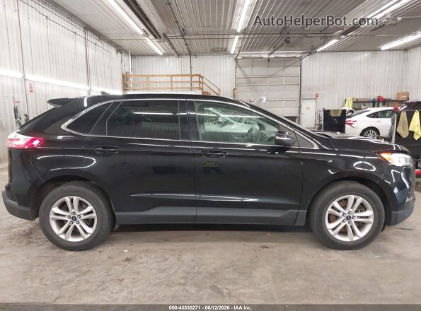 2FMPK4J98KBC40990 2019 FORD EDGE Black Սալոնի հետևի տեսք