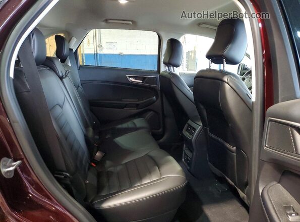 2FMPK4J99NBA42746 2022 FORD EDGE Maroon Rear interior view