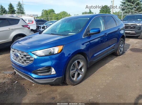2FMPK4J99NBB09037 2022 FORD EDGE Blue Vista tres cuartos delantera izquierda