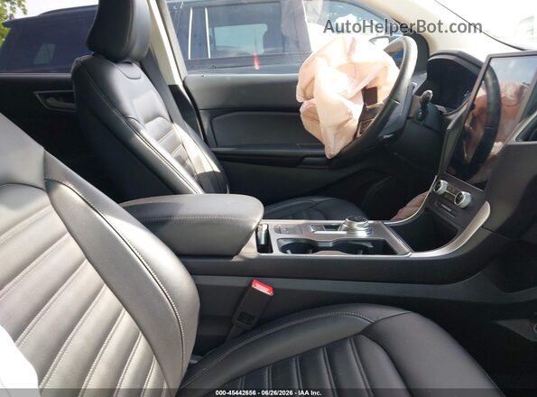 2FMPK4J99NBB09037 2022 FORD EDGE Blue Vista interior delantera
