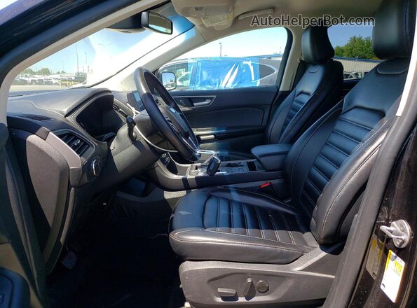 2FMPK4J99PBA38120 2023 FORD EDGE Черный Вид салона спереди