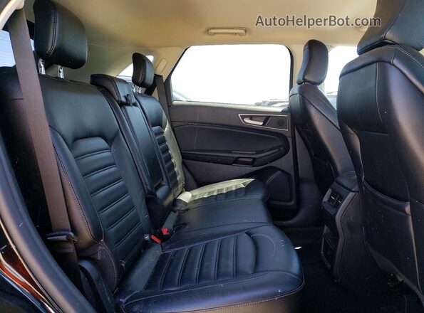 2FMPK4J99PBA38120 2023 FORD EDGE Черный Вид задней части салона