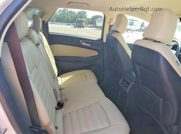 2FMPK4J99RBA42686 2024 FORD EDGE White Widok wnętrza z tyłu